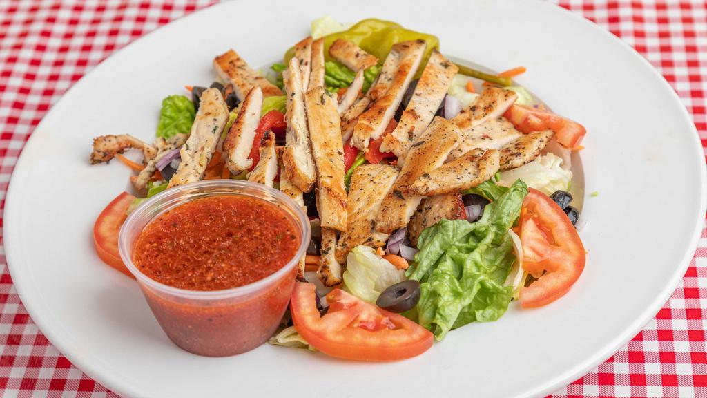 Grilled Chicken Salad · Fresh Romaine & iceberg lettuce topped with grilled chicken breast, tomatoes, carrots, onions, black olives & roasted red peppers.