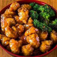 Orange Chicken Bowl · Crispy fried chicken, broccoli stir-fried with savory Orange Sauce served on top of white ri...
