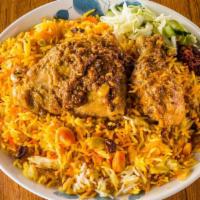 Chicken Briyani · Biryani. Indian style color rice with braised chicken.