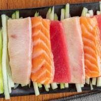 Sashimi Combo* · combination of yellow tail, salmon, tuna
