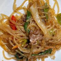 Japchae Noodles With Beef 소고기잡채 · A traditional Korean celebratory dish of stir-fried glass noodles with beef and vegetables.