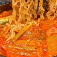 Army Stew 부대찌개 · Korean Army Stew - a spicy, savory stew made from kimchi, sausage, spam, beans and noodles. ...