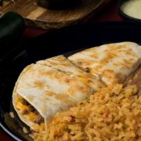 Lunch Fajita Quesadilla · Mixed cheese and your choice of beef or chicken fajita meat served with rice and your beans
