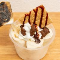 Boy Scout · Vanilla ice cream, graham cracker, teddy grahams, roasted marshmallows, chocolate syrup.