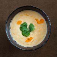 Coconut Crab Soup · roasted corn, sweet potatoes, yellow curry, coconut milk, cilantro, chili oil