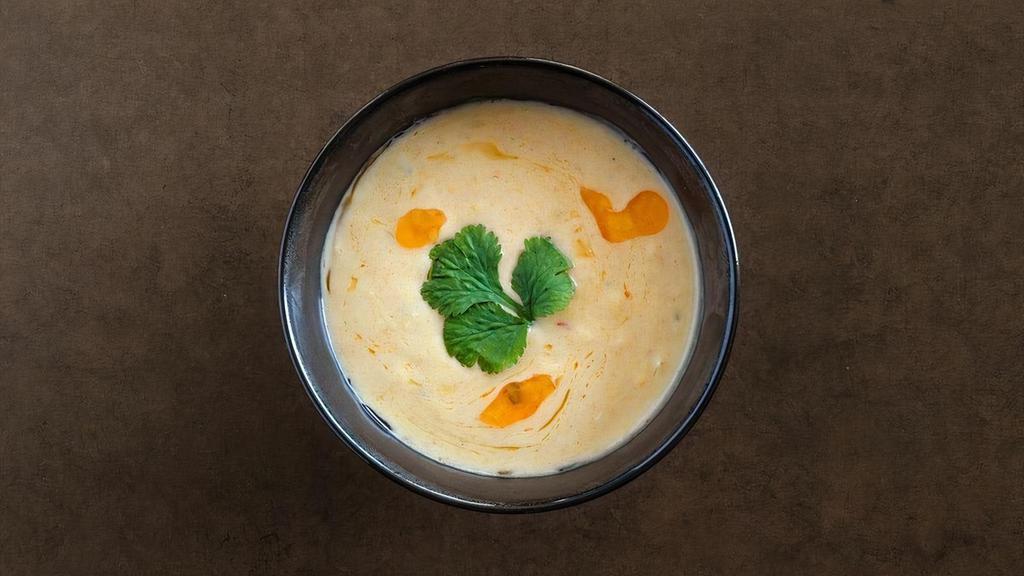Coconut Crab Soup · roasted corn, sweet potatoes, yellow curry, coconut milk, cilantro, chili oil