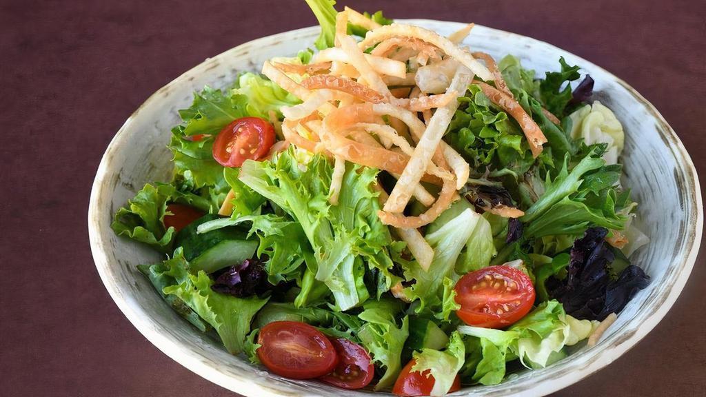 House Small (Vg) · mixed greens, cucumber, cherry tomato and crispy wonton strips with choice of dressing