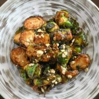 Crispy Brussels Sprouts (Vg) · tossed in a creamy lemon miso sauce and toasted cashews