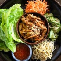 Lettuce Wraps · sautéed all-natural chicken breast with garlic, ginger, cashews and peanut sauce, served wit...
