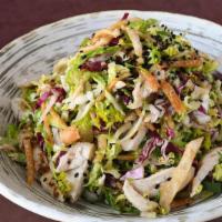 Chicken Crunch Salad · napa cabbage, romaine lettuce, radicchio, scallion, crispy wonton strips, shredded all-natur...