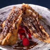 Chocolate Spring Rolls · crispy wonton wrappers stuffed with toasted cashew, cinnamon, raspberry purée and chocolate ...