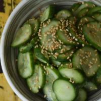 Cucumber Sunomono (Vg) (Gf) · marinated and seasoned cucumber with sesame seeds