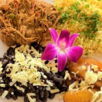 Pabellon Criollo · Delicious seasoned Shredded Beef, rice, black beans, plantains & one arepa on the side... it...