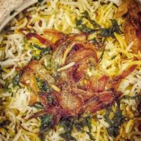 Dum Gosht Biryani · Long-grain rice cooked with tender goat and aromatic spices.