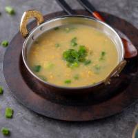 Sweet Corn Soup · Sweet corn added with ginger garlic and spring onions in vegetable Stock.