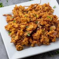 Mixed Veg Pakoda · Onions, cabbage, other veggies mixed in chickpea flour, spices, and fried until it is golden...