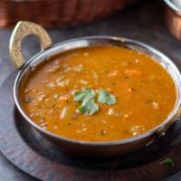 Sambar · Yellow lentil dal based vegetable with special sambar masala. Served with rice, or naan, or ...
