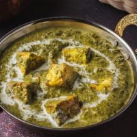 Saag · Vegetables cooked in spinach gravy with mild curry spices. Served with rice, or naan, or cha...