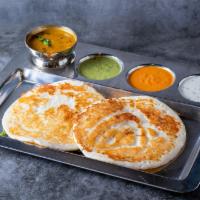 Uthappam (2 Pcs) · Rice crepe made with fermented urad dal and rice batter. Served with dipping chutney and sam...