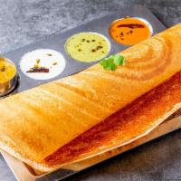 Podi Dosa · Rice crepe made with fermented urad dal and rice batter. Served with dipping chutney and sam...