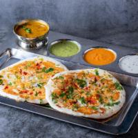 Onion Uthappam (2 Pcs) · Rice crepe made with fermented urad dal and rice batter. Served with dipping chutney and sam...