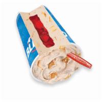 Royal New York Cheesecake Blizzard® Treat · Cheesecake pieces and graham blended with creamy vanilla soft serve then filled with a perfe...