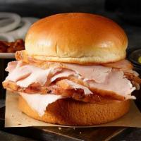 Turkey Classic Sandwich Plate · Order your favorite smokin' turkey sandwich served with 2 sides today!