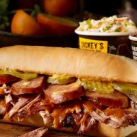 Cueban Sandwich Plate · Pulled pork with lemon pepper, jalapeño cheddar sausage, mustard & pickles on a toasted hoag...