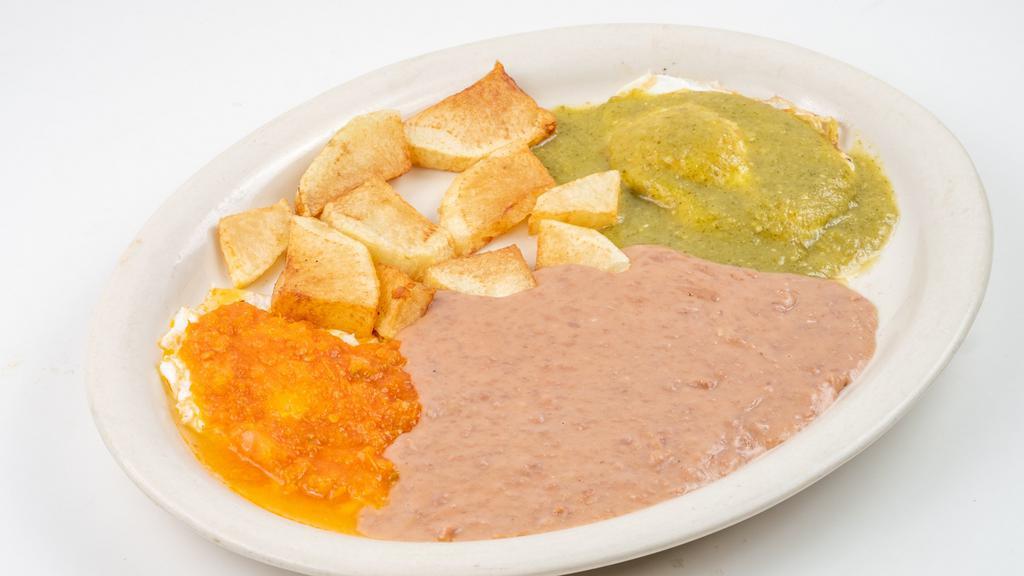 Huevos Divorciados Plate · 2 eggs served with salsa verde and salsa ranchera, a side of potatoes, refried beans and 2 tortillas