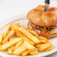 Monterrey Burger Combo · Double meat burger with cheese, ham, bacon, avocado, lettuce, tomato and pickles served with...