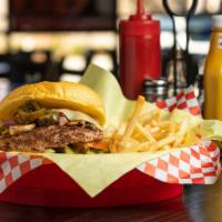 Gold Digger Burger · A loaded cheeseburger with grilled jalapenos, grilled onions, grilled mushrooms, thousand is...