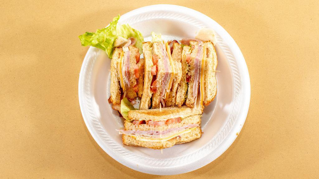 Chicken Club · Grilled chicken with ham, bacon, lettuce, tomato, swiss and American cheese, mayo.