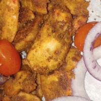 Suya Chicken Wrap · Chicken slice carefully grilled over open pit with suya rob that gives that perfect taste. Y...