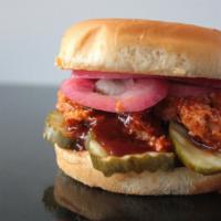 The Bbq Chiq · Between these toasty buns is a heapin' helpin' of chopped grilled Chiqn™ slathered in BBQ sa...