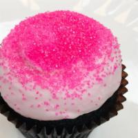 Pink Chocolate Cupcake · Chocolate cupcake topped with our signature pink buttercream frosting.