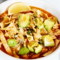 Chicken Tortilla Soup · Famous Tortilla Soup with rice & shredded chicken breast