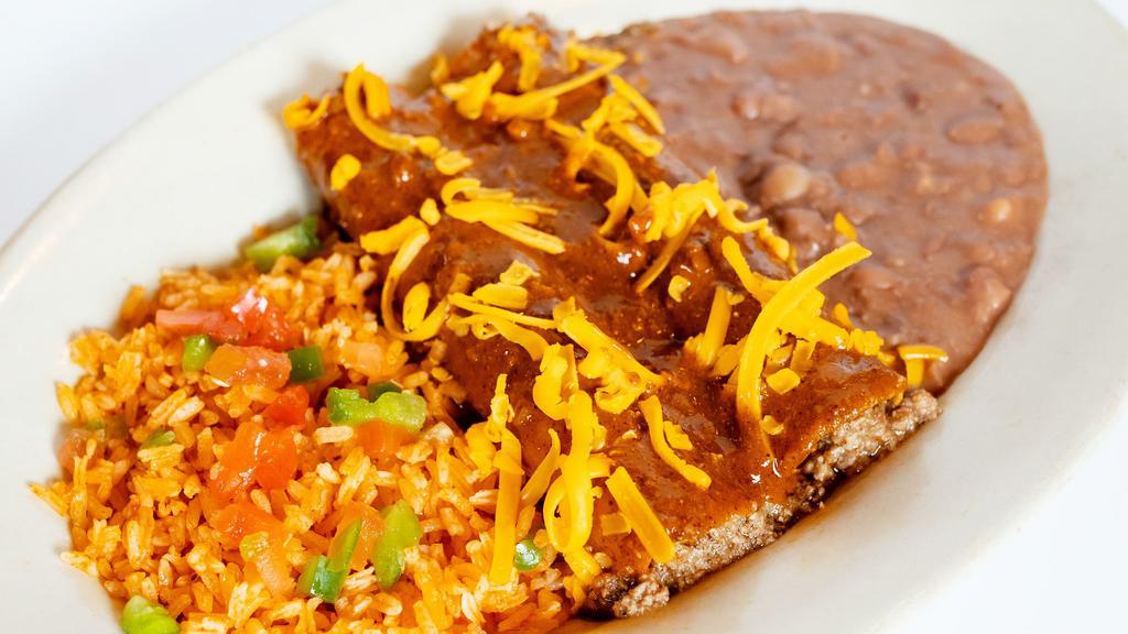 Beef Enchilada Plate · seasoned ground beef with chili con carne