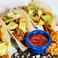 Taco Family Pack · 8 Tacos, Crispy or Soft. Choice of Seasoned Chicken or Picadillo Beef. Served with Rice, Bea...
