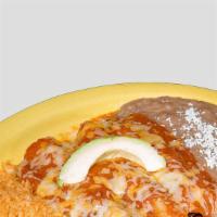 Texas Enchiladas · Three fajita chicken, beef or mixed enchiladas topped with your choice of chile con queso, c...