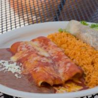 Iguana Plate · One beef enchilada, one cheese enchilada, and one beef fajita taco. Served with guacamole an...