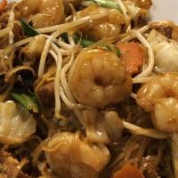Pad Thai Noodle · Traditional thai rice with bean sprouts, red and green onion, egg and ground peanuts. Served...