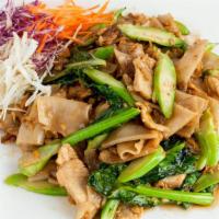 Pad See Ew Noodle · Sauteed flat rice noodles, chinese broccoli and egg in thai soy sauce. Served with chicken, ...