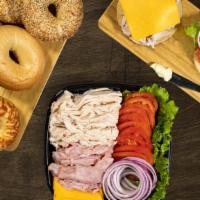 Bagel Deli Kit · An easy lunch solution for your group, this kit comes with 6 bagels (2 Plain, 2 Everything, ...