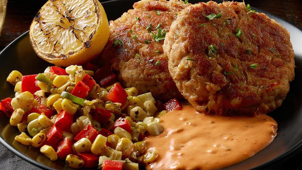 Chesapeake Bay Crab Cakes · our signature recipe with wild-caught crab meat (roasted red pepper or lemon zested tartar sauce)