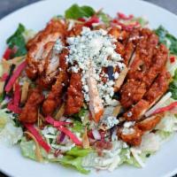 Buffalo Chicken Salad · grilled or fried chicken, wing sauce, fresh greens, bacon, white cheddar, pico de gallo, tor...