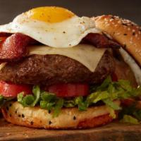 All-American Bacon Cheeseburger* · 1/2 lb patty, cheese, fried egg, “thick-cut” bacon, garden, aioli, standard side, (sesame or...