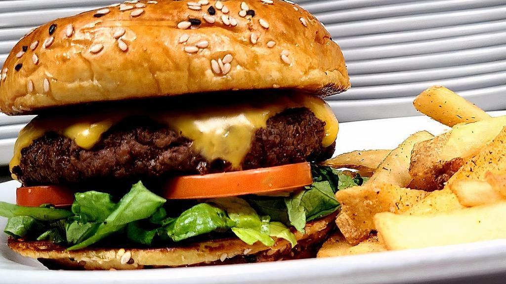 Burger With Cheese* · 1/2 lb patty, cheese, garden, aioli, standard side