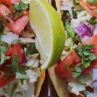 Pacific Fish Tacos Platter · grilled or fried white fish, dressed slaw, tomato, cilantro, cotija, corn-flour tortillas, r...