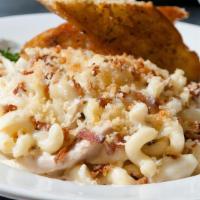Mac Daddy & Cheese · chicken, pasta, housemade cheese sauce, chopped bacon, toasted bread crumbs, garlic bread