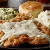 Country Fried Top Sirloin Steak · hand-breaded top sirloin, country gravy, two standard sides, buttermilk biscuit. (gravy is s...